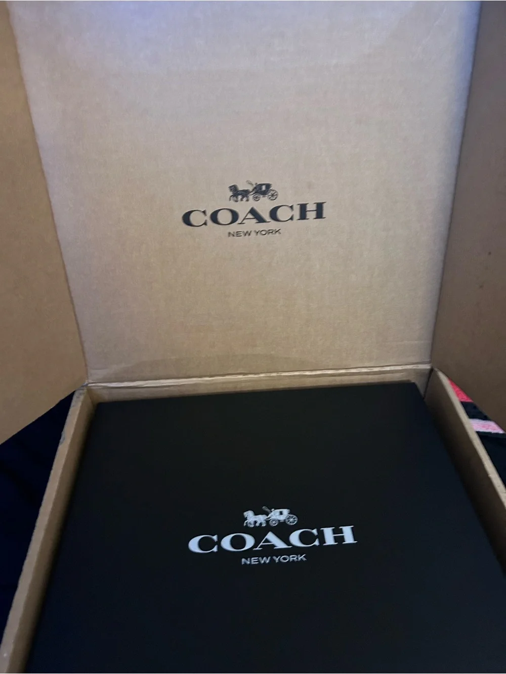 Coach sleek leather